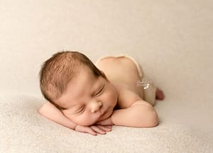 Hands-under-chin newborn-photography-milton